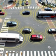 cars at crossroad emitting high tech signals